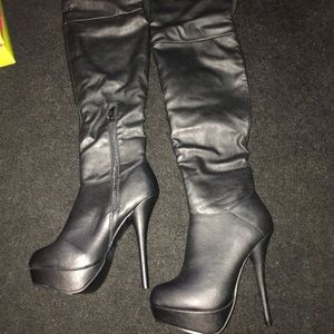 Over the knee black boots